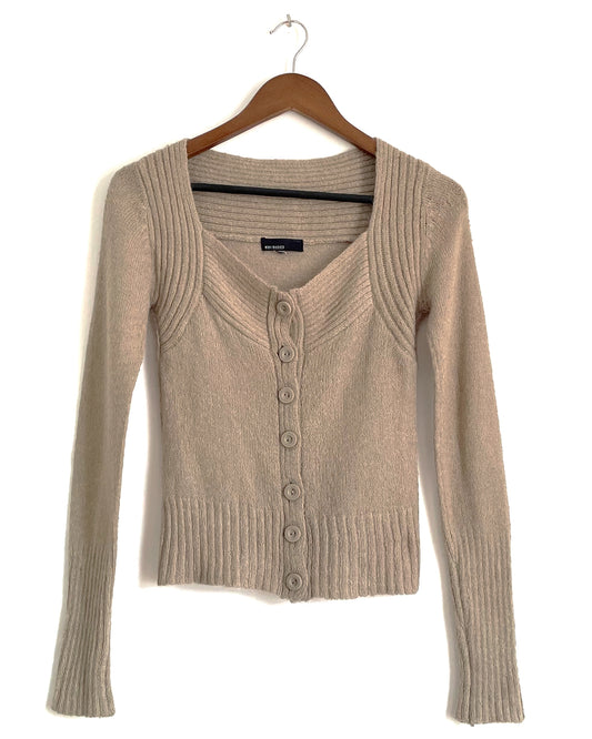 Chaqueta de punto beige. COD J35